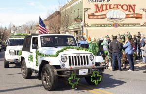 A Jeep club is festive in the green.