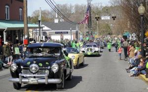 Classic cars head up Federal Street hill.