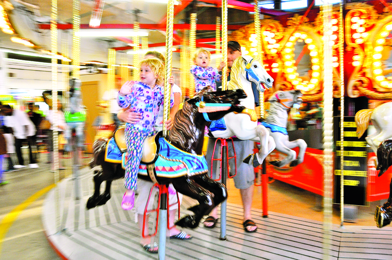 Funland has been a summer destination for generations. Games open this weekend at 10 a.m.; rides, 1 p.m.; and Haunted Mansion at 6:30 p.m. For more information, including a complete season schedule go to funlandrehoboth.com. At the center of activity in Funland, above, is the carousel. BY RON MACARTHUR