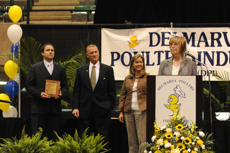 At the recent Delmarva Poultry Industry Inc. Booster Banquet, DPI President Jim Smith presented a special award to the United Soybean Board, the Delaware Soybean Board, the Maryland Soybean Board, and America’s soybean farmers in appreciation of their financial commitment to Delmarva’s chicken industry. Accepting the award were Sandy Davis from the Maryland Soybean Board, Kevin Evans from the Delaware Soybean Board, and Susanne Zilberfarb with the Delaware and Maryland soybean boards. Shown are (l-r) Evans, Smith, Zilberfarb and Davis. SOURCE SUBMITTED