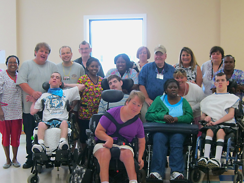 Delaware Mentor offers day programs in Millsboro; now in an expanded space. After a fun afternoon of karaoke, the group posed for a picture. Shown in back are (l-r) Marie Henry; Max Twigg; Michael Bush; Ronald Senior; Nakita Cook; Andrea Sabb; Lisa Wolfgang, program support coordinator; Ralph Davis; area director Nancy Biel; Jessica Holden; and Lonell McCray, supervisor. In front are Zach Dickerson, Dean Quillen, Katie Brittingham, Lydia Tilden, assistant director Robyn Atkins and Thomas D'Armi. BY RACHEL SWICK MAVITY