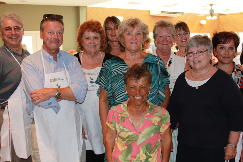 Volunteering for the 6th Annual Wine Tasting & Art Auction to benefit Kinfolk are (l-r) Dave McGuigan, Kevin Fleming, Terry Bradley, Lisa Thorp, Cheryl Blackman, Judge M. Jane Brady, Becky Carney, Melinda McGuigan, Kathy McNamara and Bobbi Engel. BY MELISSA STEELE PHOTOS