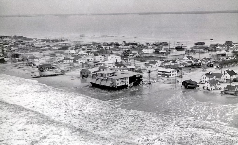 The Atlantic Ocean and Rehoboth Bay meet as Dewey Beach is flooded during the Storm of '62. COURTESY NORMAN ROSSITER