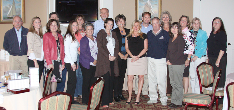ResortQuest 2011 top producers include in back (l-r) Brendan Crotty (partially obscured), Tammy Hadder, Robert Kauffman, Patrick Davis and Linda Quasney; in front are Bill Hand, Christy Conaway, Despina Kaneles, Nicole Peterdozzi, Anna Meiklejohn, Colleen Windrow, Dayna Feher, Ann Baker, Marc Grimes, Kae Quillen, Anne Powell, Charlene Sanford and Sandy Greene. SOURCE SUBMITTED