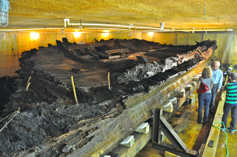 Chuck Fithian, the state's curator of archaeology, talks to members of the press during a tour of the HMS DeBraak hull. The historic site will be open to the public for the first time, starting June 4. Archeologists say the ship was probably built before 1780; it sunk off Cape Henlopen in 1798. BY RON MACARTHUR