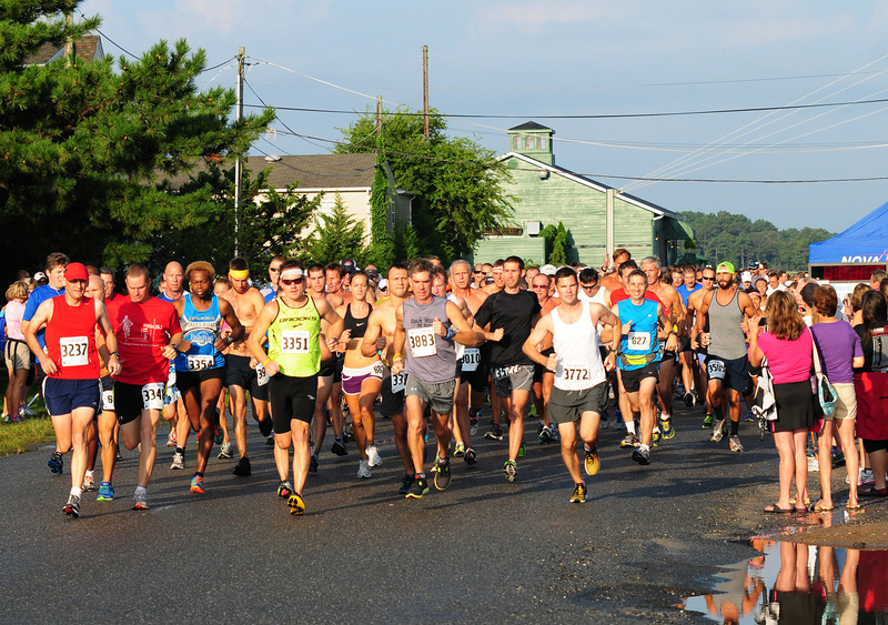 Enos Benbow wins 36th Gary P. Lister Bottle & Cork 10Miler Cape Gazette