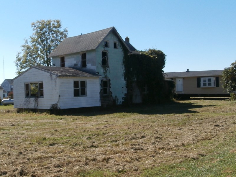 The newest home to be donated toward the revitalization efforts in West Rehoboth is temporarily parked behind the old Sumlin home, which will be demolished. BY MOLLY MACMILLAN