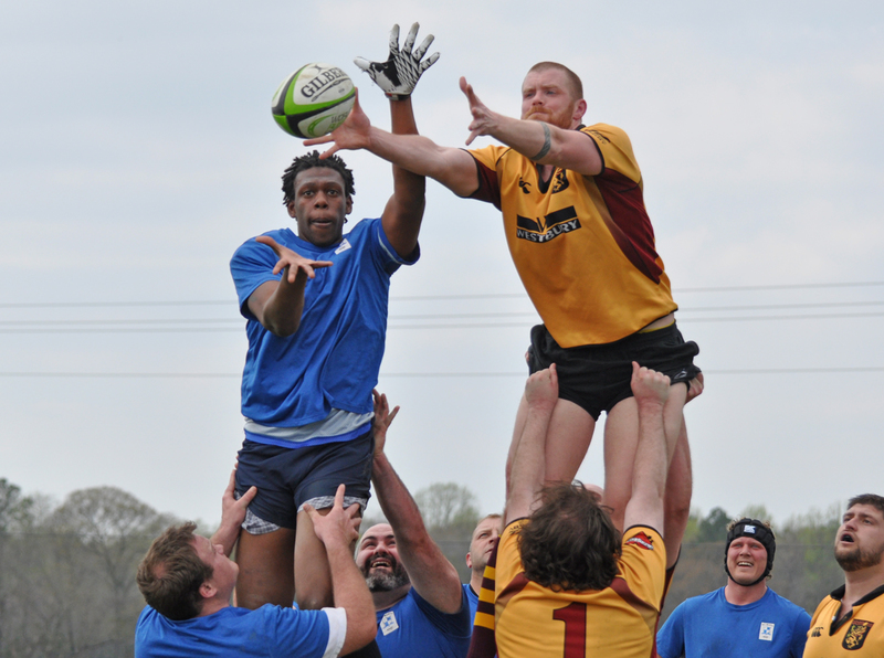 Delmarva's AJ Williams, left, reaches for the ball during a line-out throw in. BY NICK ROTH
