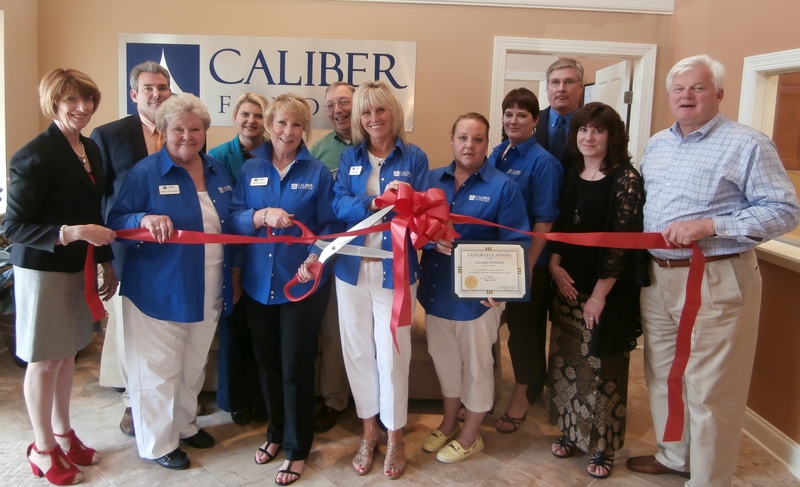 The Cape Region business community recently welcomed Caliber Funding on Willow Creek Road. Shown are (l-r) Betsy Reamer and Peter Alvarez, Lewes Chamber of Commerce; Barbara Brittingham, Caliber Funding; Jen Joseph, Lewes Chamber of Commerce; Anne Daniels, Caliber Funding; Orville Mills, Lewes Chamber of Commerce; Laura Mestro, Karen Lamaire and Kate Leary, Caliber Funding; Gary Huegel and Joann Zaloga, Lewes Chamber of Commerce and Ted Becker, Lewes deputy mayor. BY MOLLY MACMILLAN