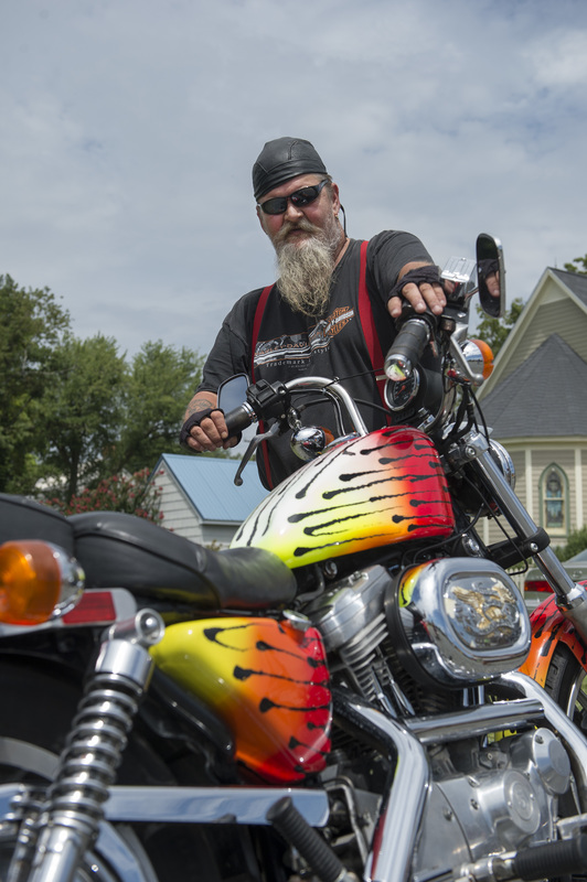Madison Remick joined the machinery and vehicles display with his 1993 Harley Sportster. BY DENY HOWETH