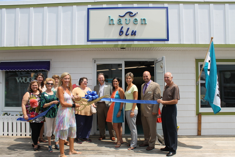 Pictured at the Haven Blu ribbon cutting are (l-r) Terri Mahoney, ambassador; Jamie Idzi, owner of Yuppy Puppy; Marilyn Panagopoulos, ambassador; Lise O’Connell, ambassador; Jen Vernon, owner of Haven Blu; Veronica Bona, ambassador; David Martin, Bethany-Fenwick Area Chamber of Commerce executive director and friend of Haven Blu; Kristie Maravalli, chamber director of membership; Corey Walsh, ambassador and Taylor Bank; and Kevin McCourt, ambassador. SOURCE SUBMITTED