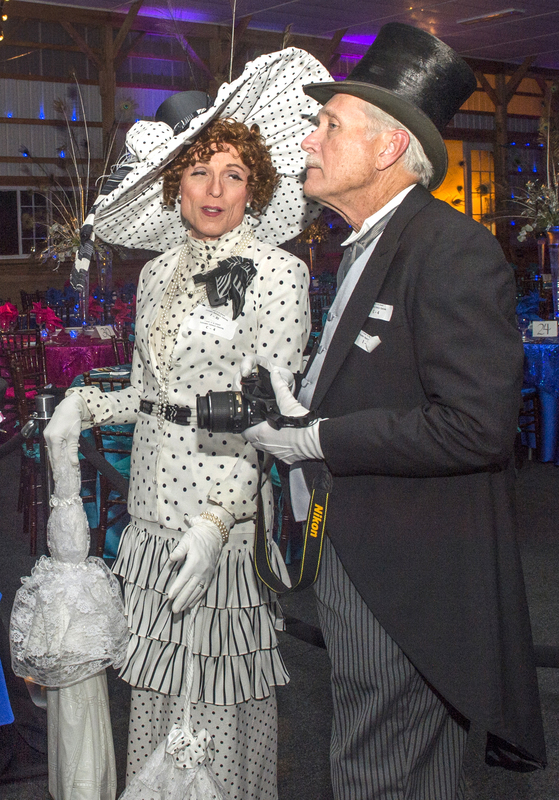 David and Lawrence Lasher-Pennington dressed as Eliza Doolittle and Colonel Pickering. BY DENY HOWETH