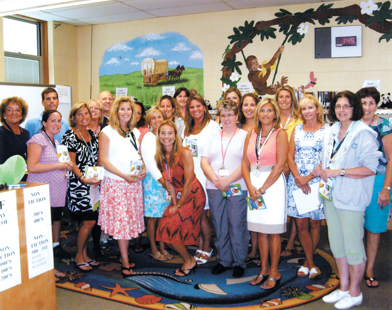 Shown are in back (l-r) Walmart Personnel Manager Lonnie Brown, Tim Bamforth, Juanita M. Clendaniel, John E. Sell, Mabel Sarah Norwood, Jennifer L. Adams, Jodie L. Daminger, Candice Ruckle, Linda M. Fisher, Amanda Archambault, Meghan Catts, and Mary Smith. In front are Meghan L. Davis, Deborah Sharp, Marybeth Betts Peet, Stephanie Dewitt, Principal Jennie Nauman, Gail Drummond, Kimberly Lynn Corbidge, Diane Marshall, and Jeanne M. Coherd. Not shown is Robin Harper Wray. SOURCE SUBMITTED