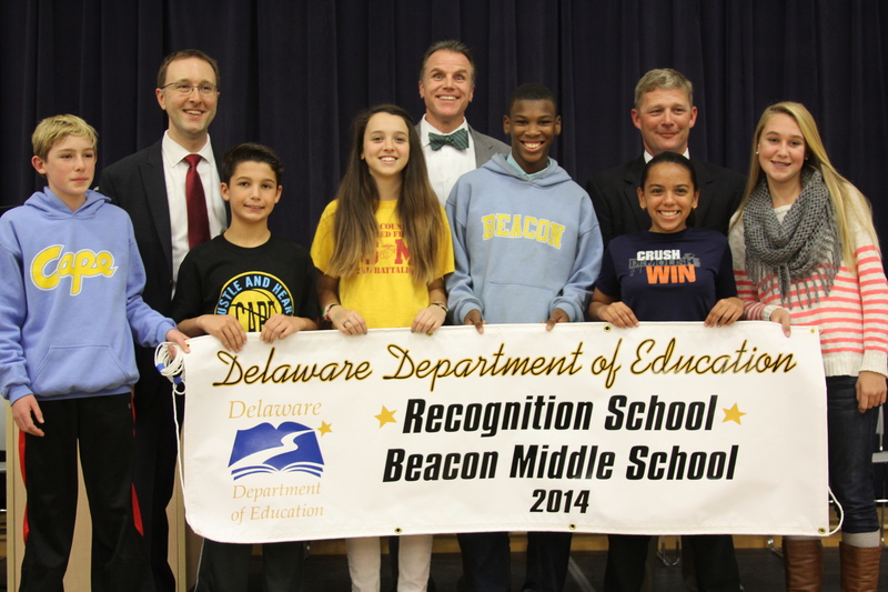 Beacon Middle School staff and students celebrate their monetary award Nov. 18 and recognition given to them by the state for test score achievement. Pictured are (l-r) Reed Jones, Secretary of Education Mark Murphy, Gabe Casapulla, Clarice Boslet, Cape Henlopen Superintendent Bob Fulton, Kenneth Witherspoon, Sierra Gloria, Beacon Principal Dave Frederick and Lee-Lee Wilson. BY MELISSA STEELE