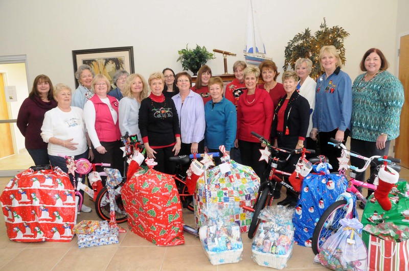Shown with some of the gifts are standing in back (l-r) Debbie Chamberlain, Joyce Ferry, Jan Willis, Gail Peck, Kathy Seigel, Cheri Quilan, Terry Shiffman and Nancy Strickler. In front are Marie Bolsch, Joyce Lenzo, Roberta Desch, Carol Aversa, Dora Nemeth, Jan Raggie, Patti Whitaker, Janice Blain, Eileen Hagerty and Kindness Chair Arlene Hannon. BY STEVEN BILLUPS