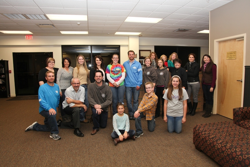 Holiday meal helpers are in back (l-r) Jessica Dukes, Denise Crockett, Breanna Bly, Joanna Chelariu, Lyndsay Humphreys, Larry Haas of the Food Bank, Jen Wright, Madeline Ruffcorn, Kaylee Banning, Sophia Ruffcorn, Cherie Nolt, Kendyl Wright, Sarah Ruffcorn, and Kim Nechay of Perdue. In front are Scott Crockett, Mark O’Day, Mike Dobson, Abbi Nechay, Breyden Wright, and Madi Nechay. SOURCE SUBMITTED