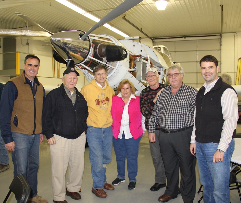 Among those who attended the Chorman event outside Greenwood are (l-r) Sixth District Sen. Ernie Lopez, Sussex County Councilman Sam Wilson, Sussex County Councilman Vance Phillips, Mary Ann Chorman, Joe Hudson, Allen Chorman and Jeff Chorman. They're standing in front of Chorman's newest spraying aircraft, a Thrush Turbo Prop 510P jet. BY DENNIS FORNEY