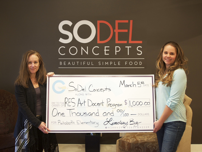 The Global Delaware Fund of SoDel Concepts donated $1,000 to the the Rehoboth Elementary School Art Docent Program, which brings art history into each of the school’s classrooms. Shown are Nelia Dolan, left, program director and Lindsey Barry, SoDel Concepts controller. SOURCE SUBMITTED