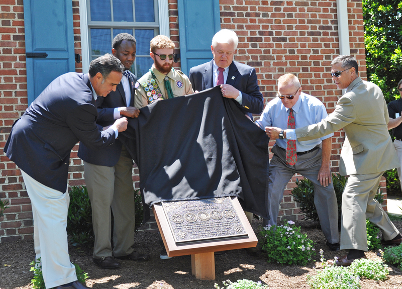 Unveiling the Fallen Heroes Memorial Plaque are (l-r) Sen. Ernie Lopez, R-Lewes; Larence Kirby, Air Force chief master sergeant retired and executive director of the Delaware Commission of Veteran's Affairs; Eagle Scout Candidate Collin Sullivan; Lewes Mayor Ted Becker; Francis E. McAroy Jr., Air Force master sergeant retired; and Rep. Steve Smyk, R-Milton. BY NICK ROTH