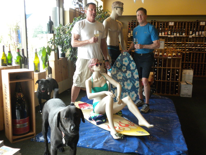 Bin 66 Fine Wine and Liquors has been selected by the Best of Delaware Awards as Best Wine Store, Downstate for the sixth time. Shown are owners Tom Poor, left, and Tom Bachmann with their wild and crazy friends, cellar dogs Ariel and Regan and mannequins Greg and Marsha, who are dressed for the beach. SOURCE SUBMITTED