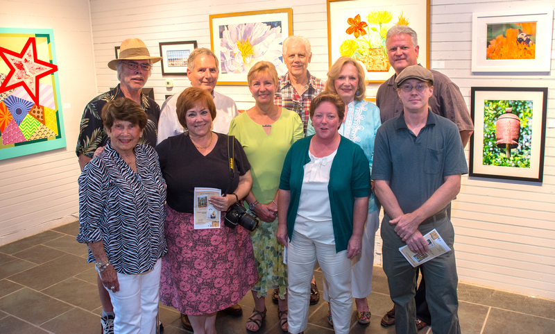 Awards were presented at the opening reception to artists Dennis Young, Steve Rogers, Joan Fabbri, Peter Feeney, Louise Gatanas, Josef Kelly. Carol Dyer, front l-r, Jennifer Carter, Sheila Bravo, RAL executive director, and Bill Wolff. BY DENY HOWETH