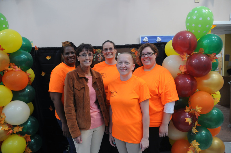 Administrators from the three centers gathered in the fall -themed photo booth for a photo. Shown in back are (l-r) Molly White, Rehoboth administrator; Gina Lang, Lewes administrator; and Jill Byrne, school age administrator. In front are Debbie Toner, owner; and Katie Bowser, Townsend administrator. BY STEVEN BILLUPS