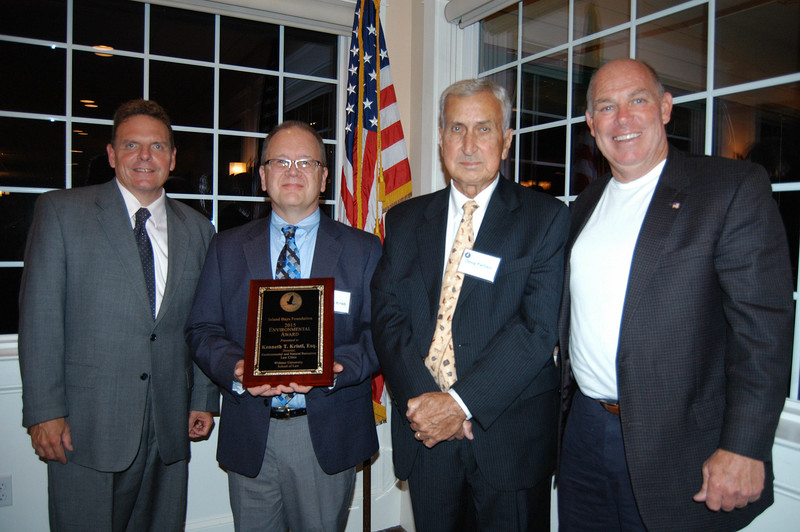 Attorney Kenneth Kristl, second from left, was named the Environmental Friend of the Inland Bays by the Inland Bays Foundation. Joining Kristl (l-r) are Department of Natural Resources and Environmental Control Secretary David Small, Inland Bays Foundation President Doug Parham and Speaker of the House Rep. Pete Schwartzkopf, D-Rehoboth Beach. BY MADDY LAURIA