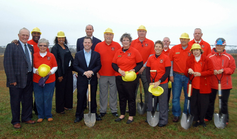 Breaking ground on a new facility for homeless female veterans are (l-r) Rep. David Wilson, R-Lincoln, board member Greg Fuller, board member Toni Bergfelder, Lt. Col. Angela Showell of Delaware National Guard, veteran Sean Barney, Drew Slater from Congressman John Carney's office, board members Al Weir, Beth McGinn, Jim Joyce, Cyndi McDougall, Ed Feeley, Dave Markowitz, Barbara Carrow, David Strawbridge and Ruth Irwin. BY MADDY LAURIA