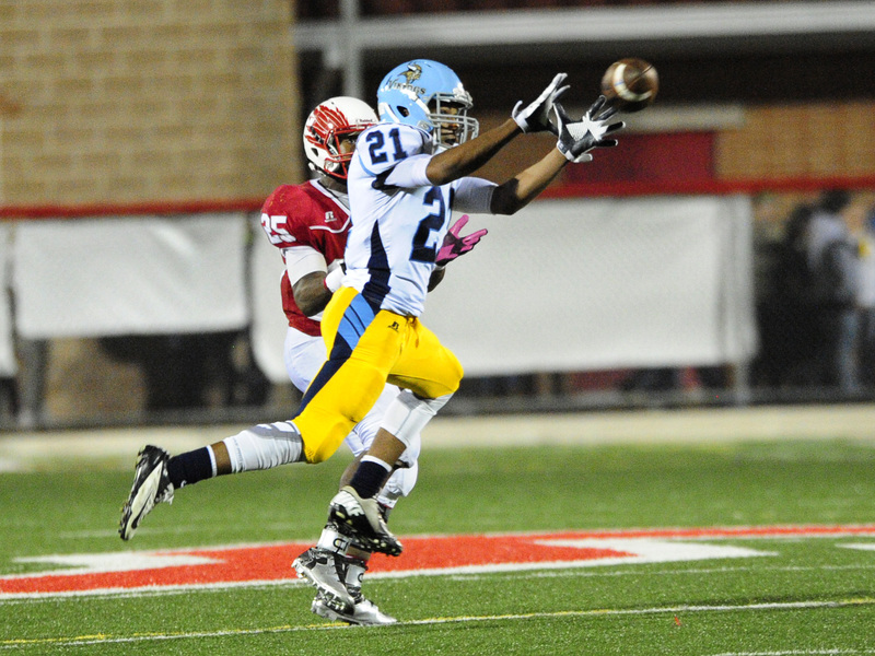 Cape defensive back Jerry Harden picks off a pass from Smyrna quarterback Nolan Henderson in the Vikings' 60-19 loss to the Eagles. BY DAN COOK