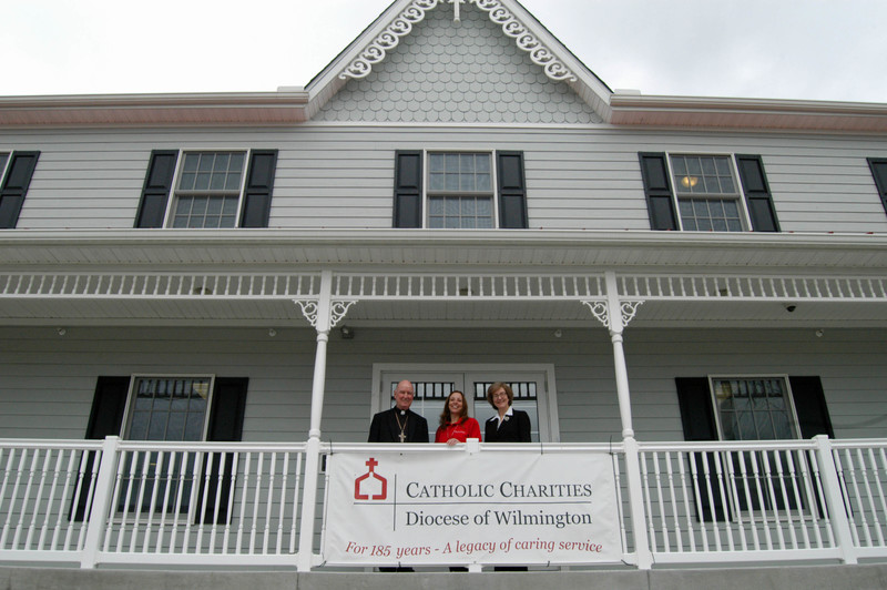Celebrating the dedication of Casa San Francisco's new Milton home are (l-r) Bishop of the Catholic Diocese of Wilmington The Most Reverend W. Francis Molooly, Casa San Francisco Program Manager Melinda Woolf and Catholic Charities Executive Director Richelle Vible. BY MADDY LAURIA
