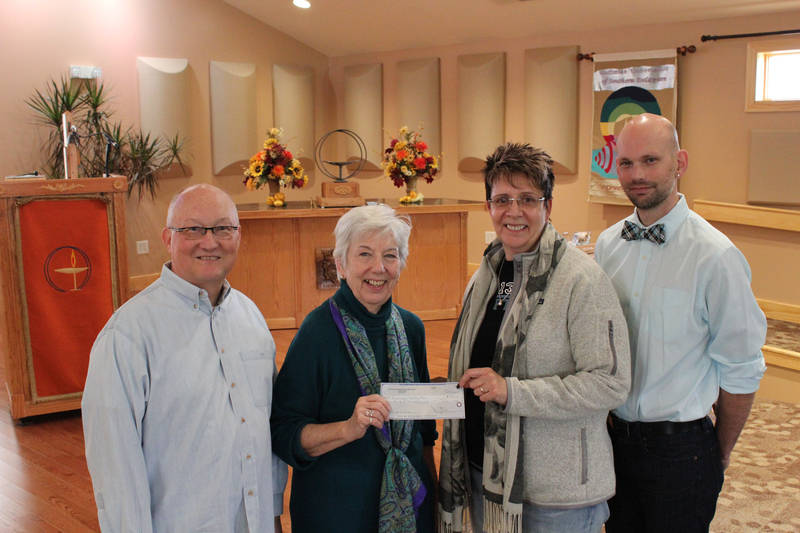 Shown are (l-r) Don Peterson, Unitarian Universalists of Southern Delaware, chair of the Social & Environmental Justice Committee; Deanna Duby, Unitarian Universalists of Southern Delaware president, board of trustees; Janet Idema, Immanuel Shelter Inc., president, board of directors; and Rex Rogosch, Immanuel Shelter Inc., member, board of directors. BY DENY HOWETH
