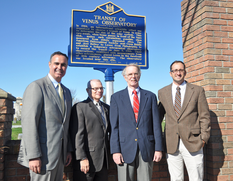 At the unveiling of the historic marker for the Transit of Venus Observatory in Lewes are (l-r) Sen. Ernie Lopez, R-Lewes; state archivist Stephen Marz; Jim Morrison, local resident who researched and wrote about the transit; and Mike DiPaolo, executive director of the Lewes Historical Society. BY NICK ROTH