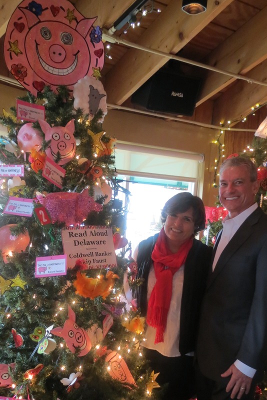 Skip Faust sponsors Read Aloud Delaware's holiday tree at Grotto Pizza