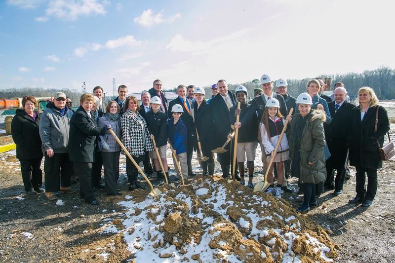 A group of students, community and school leaders gathers on the site of the new middle school wing. Shown In back, (l-r) Janet Messick, Gary Wray, Rasheeda Onasayna, Nancy Feichtl, Dustin Parker, Bill Allan, Gene Dvornick, Billy McEvoy, Kimberly Lane, Andy McCulley, Jennifer Crawford. In front (l-r) are Kathy Cripps, Maureen McLaughlin, Janet Owens, Grant Allen, David Hawtof, Jennifer Scott, Brian Prettyjohn, Joshua Johnson, Allen Stafford, Brighid Loftus, Patricia Oliphant. SOURCE SUBMITTED