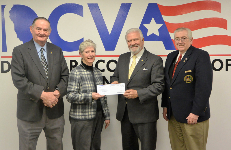 Shown are (l-r) Paul Davis, vice president, Friends of Delaware Veterans; Carolyn Humes; Dave Skocik, president, Friends of Delaware Veterans; and Dr. Ron Sarg, chairman, Delaware Commission of Veterans Affairs. SOURCE SUBMITTED