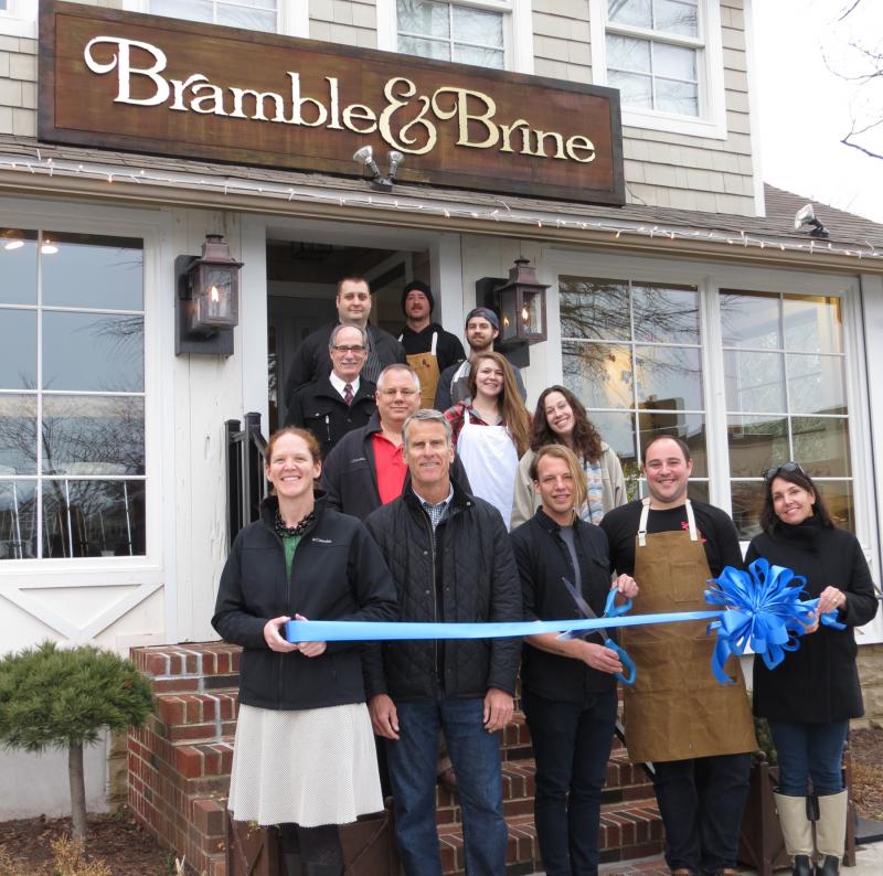 Shown are in back (l-r) Michael Handges, Ian Smith and Dominic Ciampo. In the third row are manager Henry Dawson and Joanie Shinn. In the second row are Bruce Churchman and Anna Short. In front are Meghan McCalley, Rehoboth-Dewey Chamber; Paul Kuhns; owner Joe Churchman; Rob Bagley; and Kathy McGuiness. SOURCE SUBMITTED