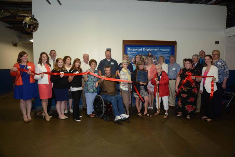 Shown at the ribbon cutting in back are (l-r) Jason Crouch, KSI vice president; Kathy Jackson, vice president’s executive assistant; Tom Mehl, Milford Lions; Joe Taylor, Proctor & Gamble; Jo Schmeiser, Milford Chamber executive director; Laurie Judd, administrative assistant; Dr. Donna Smith-Moore, KSI board member; Barbara Wilson, KSI Human Resources; Bryan Pepper, board of directors; Bill Allen, Delaware Community Fund senior vice president; Craig Crouch, KSI CEO; Marion DiRubbio, KSI Health and Safety coordinator; and Victoria Monahan, Discover Bank. In front are Kara Curtis, Hertrich Toyota; Courtney Hasting, Hertrich Toyota; Meghan Coskey, Hertrich Toyota; Teresa Knotts, Proctor & Gamble; Luay Mehl, Milford Lions; Scott Ward, KSI Board of Directors; Mary Ann Varanko, KSI; Susie Kelly, KSI; Mary Jane Cook, KSI; Michelle Cain, KSI; and Amy Walls, Discover Bank. STEVEN BILLUPS PHOTO. ribbon