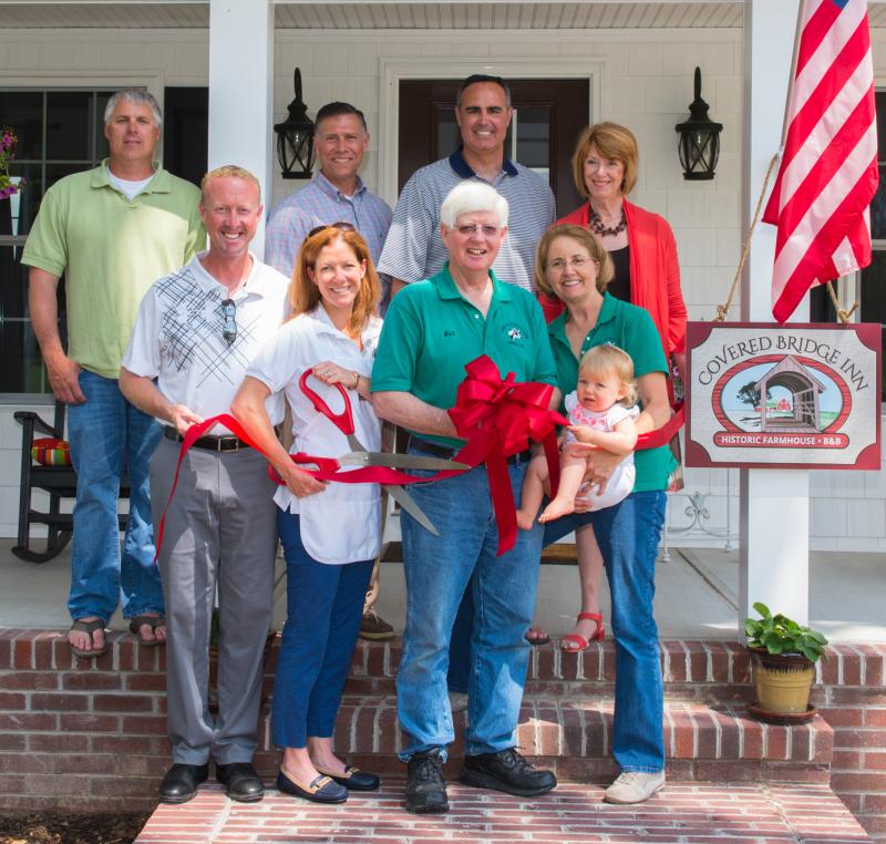 The Covered Bridge Inn will be hosting an Open House for the community Sunday, June 5, from 11 a.m. to 3 p.m. All are invited to come out and tour this adorable historic Inn that is bursting with beauty and character. Shown during the ribbon cutting in back (l-r) are Mike Newcomb, general contractor; Rep. Steve Smyk, R-Lewes-Milton; Sen. Ernie Lopez, R-Lewres; and Betsy Reamer, Lewes Chamber of Commerce. In front, Shawn Glassmeyer, Innkeeper Ingrid Hopkins Glassmeyer, Walter Hopkins and Jenny Hopkins with granddaughter Olivia Remfer. SOURCE SUBMITTED