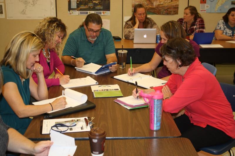 Faculty and staff of The Jefferson School working on a mindfulness exercise during a presentation by Minds Over Matter Initiative. Shown are in back (l-r) Heidi Maradiaga, Kate Marvel and Stefine Pitzer. In front are Christine Falcone, Laurie Smailer, Brad Barndt, Colleen Eisenmann and Patty White. SUBMITTED PHOTO