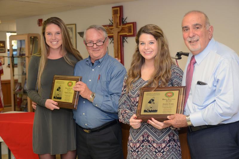 The Brian Piccolo Committee couldn’t pick a single athlete/scholar because both were superior students. So both nominees received the awards. Shown are (l-r) Madison McGee; Nick Ruggiero, president UNICO Delmarva Council; Jessica Evans; and George Meringolo, president Unico Rehoboth. McGee, a senior from Indian River High School, plays field hockey, basketball and softball. She plans on attending Del Tech. Evans, a senior from Cape Henlopen High School, plays softball. She plans on attending the University of Georgia. Brian Piccolo