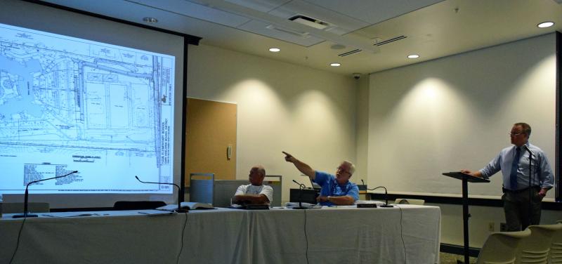 In August, Milton Planning and Zoning Commissioners Don Mazzeo, left, and Maurice McGrath, center, reviewed the preliminary site plan for a new H.O. Brittingham Elementary School as Tetra Tech Architects & Engineers Senior Project Manager Michael Berninger, right, answers their questions. No changes were made when district submitted the final site plan, which was approved by commissioners Dec. 6. MADDY LAURIA PHOTO