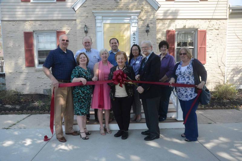 At the ribbon cutting sponsored by the Georgetown Chamber of Commerce are in back (l-r) Rep. Dave Wilson, R-Bridgeville; Scott Thomas, Southern Delaware Tourism executive director; Veronica Nock, Georgetown Del-One Branch manager; and Janie Danato, executive assistant Georgetown Chamber. In front are Michael Vincent, Sussex County County Council president; Angela Emerson, Georgetown Chamber president; Rep. Ruth Briggs King, R-Georgetown; Helen Kruger, chamber membership representative; Harris Marx, senior territory marketing manager for Real People Ratings; and Debbie Harriger, Millsboro Del-One branch manager. Real Peoples Ratings