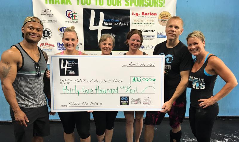 Shown at the conclusion of the CrossFit Lewes 2017 Share the Pain event are (l-r) George Dobbins, owner, CrossFit Dover; Stephanie Kichline, CrossFit Lewes trainer and event organizer; Kim Rigby, People's Place; Marcey Rezac, SAFE program director; Craig Klasic, CrossFit Lewes trainer and event chairman; and Kris Carper, owner, CrossFit Lewes. SUBMITTED PHOTO
