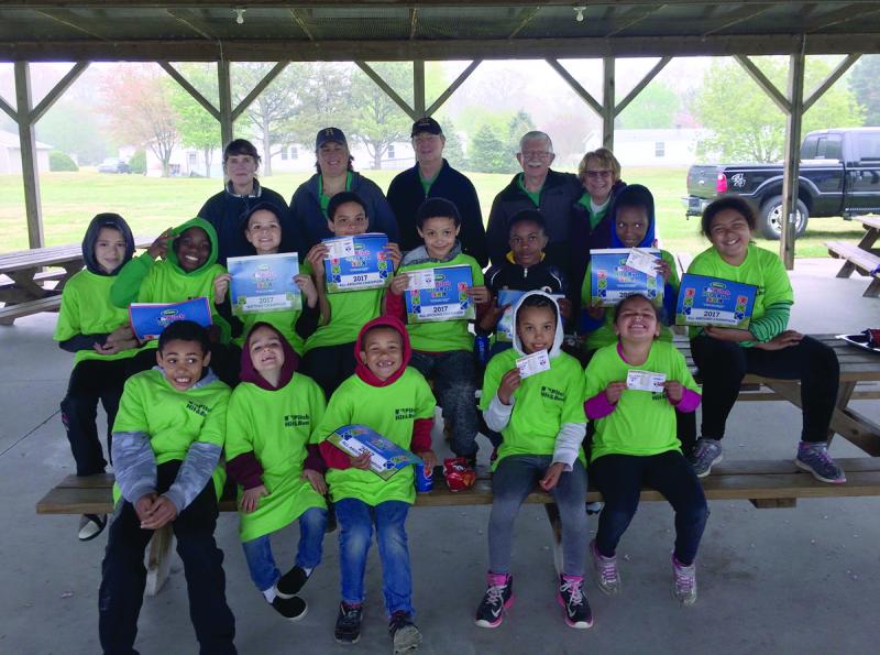 Shown in back are (l-r) Rotarians Dawn Marini, Cathy Aschiero, Dan Reed, Mike Hall and Club President Judy Hall. In middle are Chris Potter, Damari Snead, Nathan Potter, Israel Creekmore, Caleb Creekmore, Ryan Parker, Amoura White and Kiera Supplee. In front are Jeremiah Creekmore, Logan Potter, Andrew Potter, Patience Creekmore and Gia Supplee. Not shown are Jonah Simmons and Sychar Creekmore. SUBMITTED PHOTO