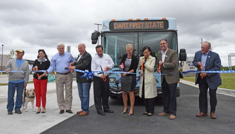 State officials gathered in Lewes May 12 to celebrate the grand opening of the new Lewes Park and Ride, just south of Five Points. Shown are (l-r) Lloyd Schmitz, a longtime advocate of DART and services for the disabled; Kathy McGuiness, Rehoboth commissioner; Lewes Mayor Ted Becker; Rep. Pete Schwartzkopf, D-Rehoboth Beach; Delaware Transit Corporation CEO John Sisson; DelDOT Secretary Jennifer Cohan; Rep. Lisa Blunt Rochester, D-Delaware; Sen. Ernie Lopez, R-Lewes; and Rep. Dave Wilson, R-Lincoln. NICK ROTH PHOTO