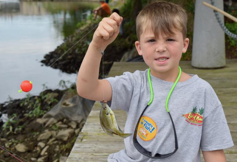 Dozens of kids hook 'em at Milton fishing tourney