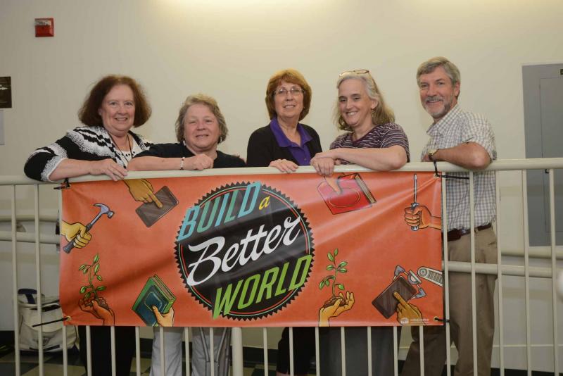 Standing behind the 2017 Summer Library Reading Challenge banner, Build a Better World, are (l-r) Mary Catherine Hopkins, Milton Library director; Kathy Graybeal, Sussex County Library director; Dr. Annie Norman, State Librarian; Tracey Quillen Carney, Delaware’s first lady; and Paul Weagraff, Delaware Division of the Arts director. Reading Challenge