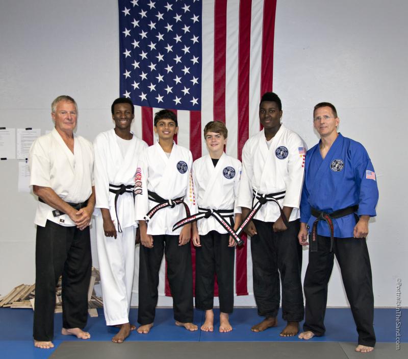 Shown are (l-r) Instructor Lance Marvel, Junior Black Belt Caden Miller, First-Class Junior Black Belt Rahul Patel, Junior Black Belt Dillon Koster, Junior Black Belt Josiah Miller and Head Instructor Sensei Ted Dabbs. PHOTOS COURTESY OF PORTRAITS IN THE SAND