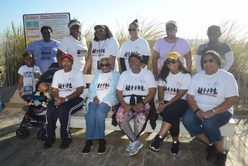The United Methodist Women of Faith United Methodist Church Walk Committee gather for a photo prior to the walk. Shown in back are (l-r) Kendall Deshields, Sallie Duffy, Secretary Angela Taylor, President Tenesha Duffy, Marlene Duffy, Dilinda Deshieldsa and Beonica Duffy. In front are Wayne C. Hall, Janie Miller, Irene Duffy, Deborah Bullard, Latoya Bonville and Linda Bonville. Not shown are Vice President Christina Miller-Hall, Treasurer Bernita Hackney and Bernadette Allen. Walk for Homeless
