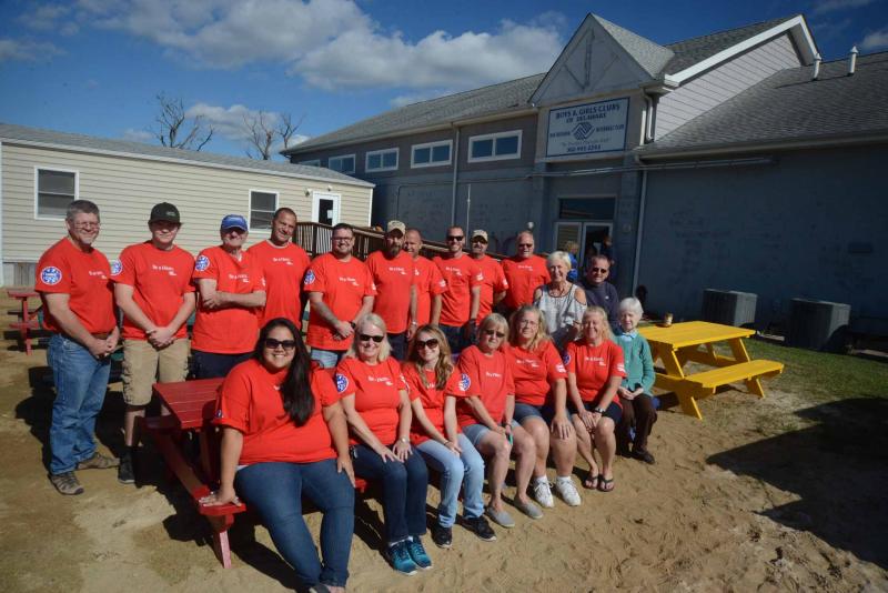 Gathered in the new picnic area, which will sprout grass soon, are the Lowe’s Heroes. Shown in back are (l-r) Mark Lenhart, Chase Robinson, Bob Glover, Herman Acevedo, Jewel Franklin, Gary Whetzel, Lewis Citro, Rob Steiner, Roy Bailey and Charlie Galliher. In the second row are board member Rep. Ruth Briggs King, R-Georgetown, and board member Patrick Miller. In front are Laura Sinthavorg, Alice Hutnick, Tara Matthews, Coordinator Shirley Shockley, Teresa Lewis, Beth Little and board member Sally Ledger. Boys and Girls Club